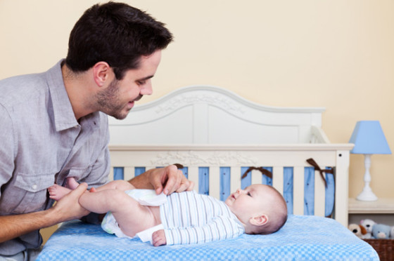 Dad Changing Infants Diaper