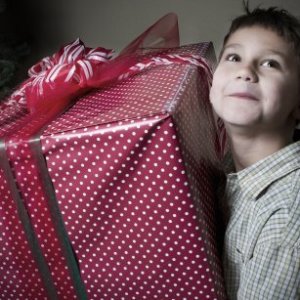 Metal Detector - kid holding gift wrapped box