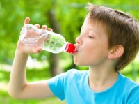 Sugar - Child drinking bottled water