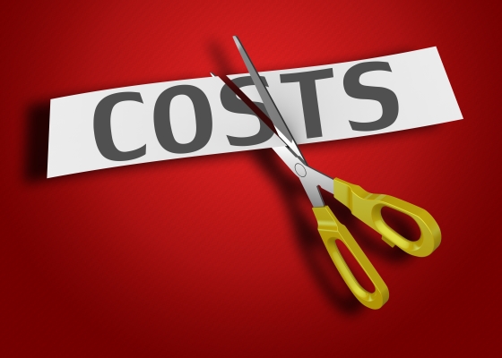 Four easy ways to cut costs at home - a banner with the word COSTS being cut by a scissors.