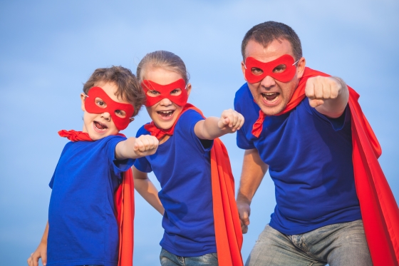 the best gift you can give your kids - stepdad and sons in costume pretending to be superheroes