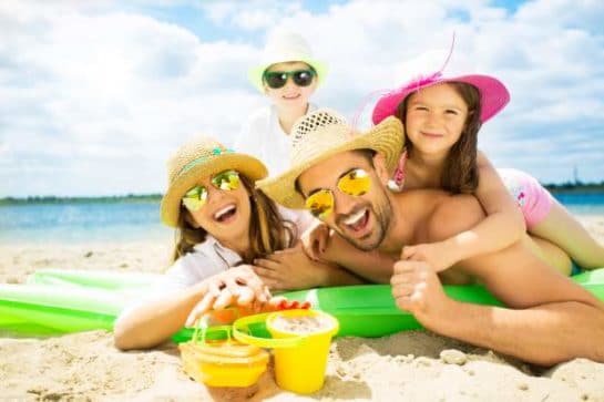 kids summer vacation-family on the beach