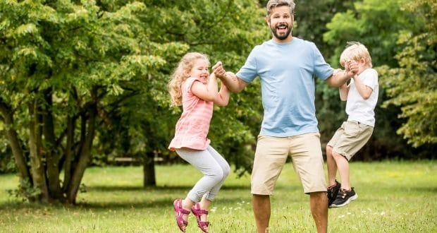 Healthy parental goals for every dad -a dad having fun with his kids