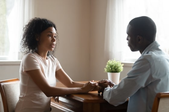 May is date your mate month - couple having a serious heart to heart