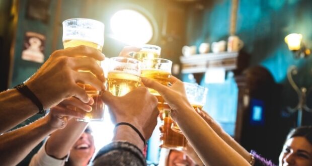 International Beer Day-Friends drinking beer