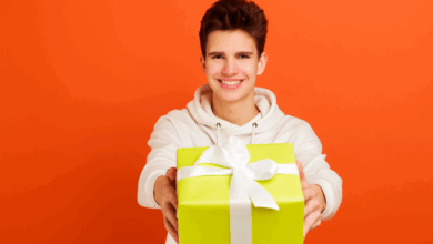Educational Toys For Tweens And Teens - happy teen with a wrapped gift.