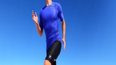 Sport runner male athlete running in compression sportswear clothing