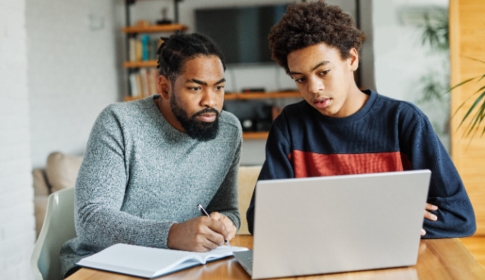 Time management and improving grades - dad helping son study