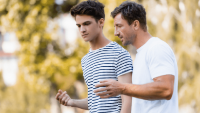 supporting teen stepchildren-stepdad speaking with teenager