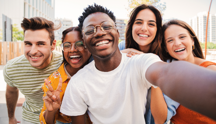 National New Friends Day-A group of friends smiling into the camera