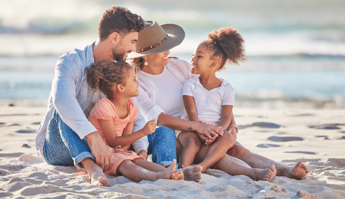 Travelling With Kids - Family on a beach