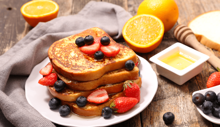 National French Toast Day - A plate of French toast and fruits