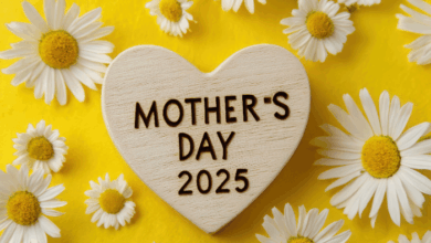 wooden heart with text "MOTHER'S DAY" and the year '2025' on a yellow background, surrounded by daisy flowers.