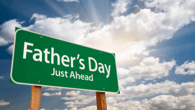 The history of father's day - road sign says Father's Day Just Ahead