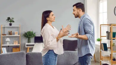 why stepfamilies fail-Emotional stressed young couple having argument at home.