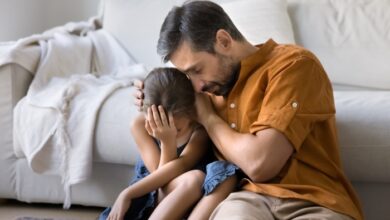 loving a child who lost their dad-Stepdads comforting little daughter