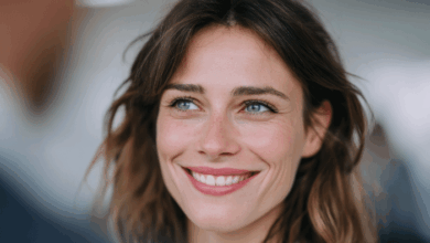 World Smile Day - a lady smiling widely into the camera