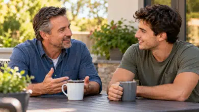 Stepdad and adult stepson building a relationship through conversation
